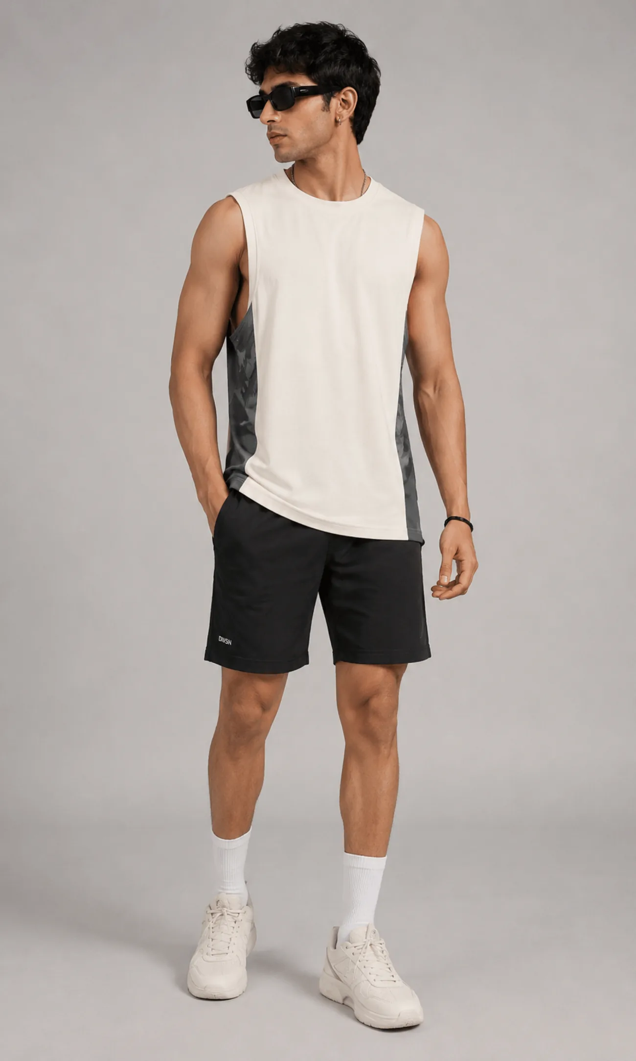 Model wearing the Vega Noir Camo Panel Muscle Tank