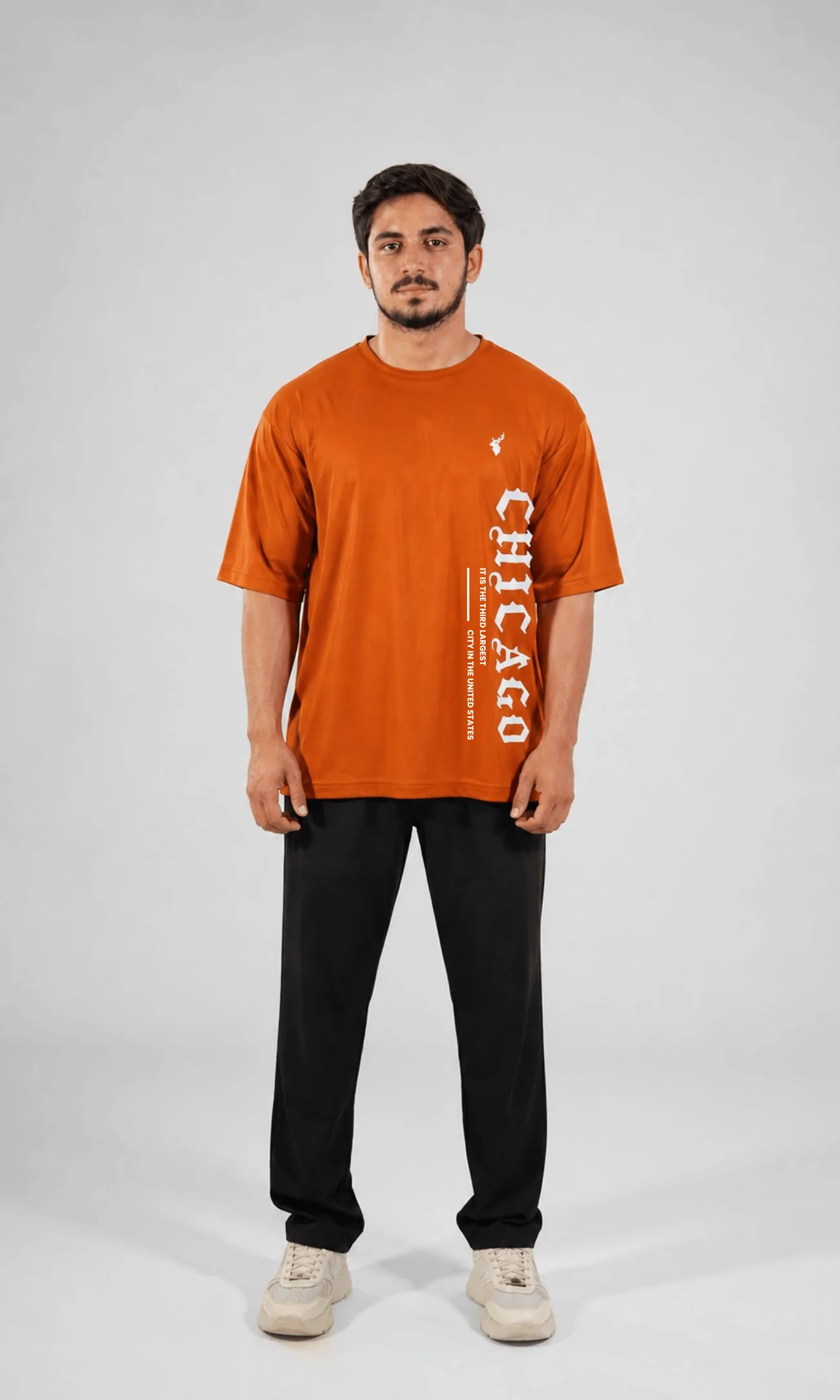 Model wearing the Vega Noir Chicago Oversized Tee