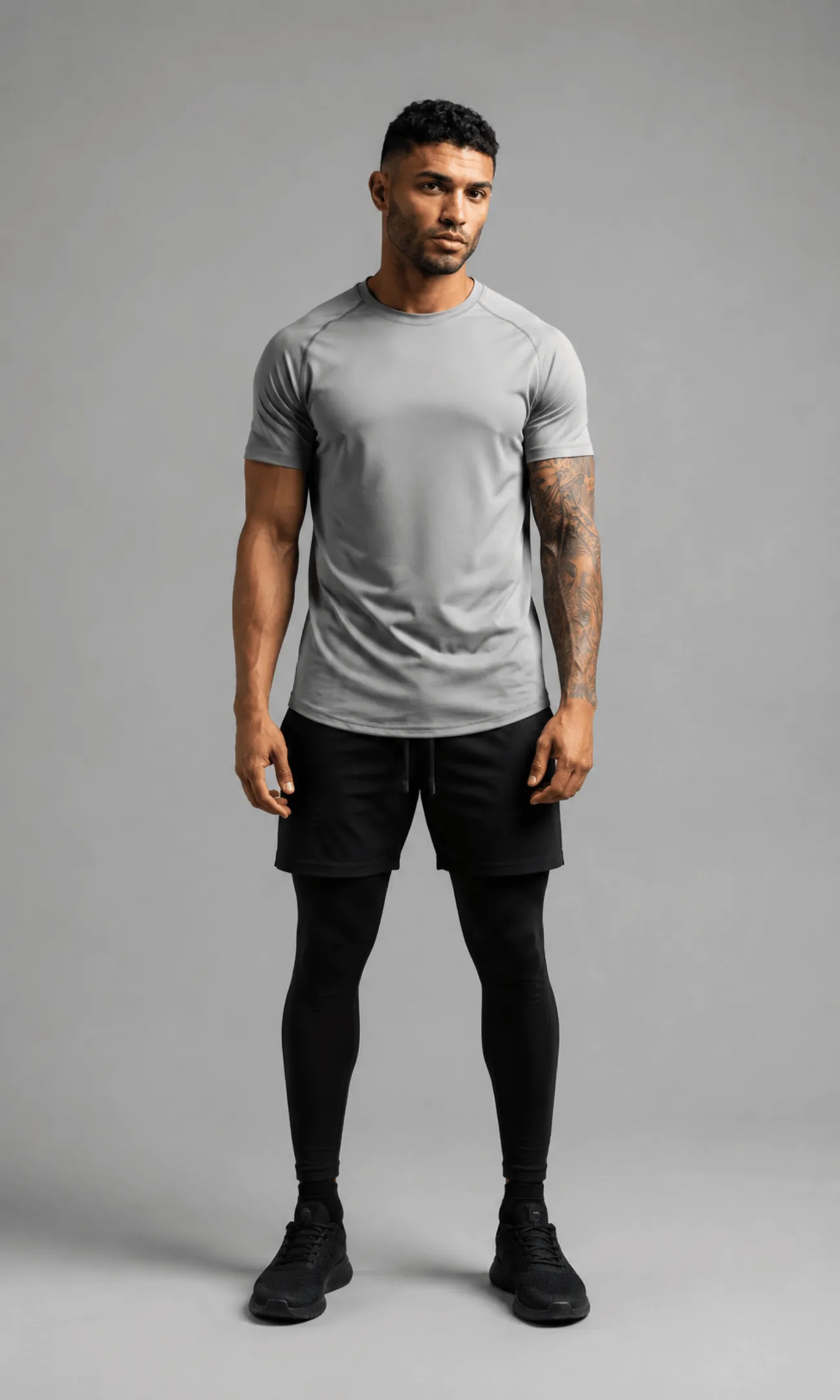 Model wearing the Vega Noir Performance Raglan Tee
