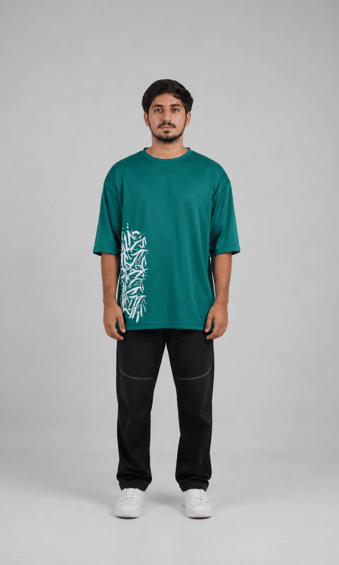 Model wearing the Vega Noir Vortex Graphic Tee